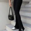 Online Legginsy damskie z rozcięciami na dole - czarne Spodnie|Legginsy